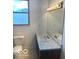 Functional bathroom featuring standard fixtures and clean finishes, optimizing space and utility at 11 W Osage St, Greenfield, IN 46140