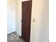 A close up of a wood door in a white room at 11 W Osage St, Greenfield, IN 46140