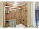 Bathroom showcasing a tiled shower with glass doors and a towel bar at 12669 Brookshire Pkwy, Carmel, IN 46033