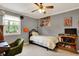 Bedroom decorated with athletic posters, a desk, and a window at 12669 Brookshire Pkwy, Carmel, IN 46033