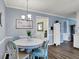 Charming dining area with round table, comfortable chairs, and elegant decor, ideal for Gathering gatherings and meals at 12669 Brookshire Pkwy, Carmel, IN 46033