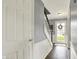 Entryway showcasing a staircase and natural light, with hardwood flooring at 12669 Brookshire Pkwy, Carmel, IN 46033