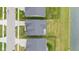 An aerial view shows the rooftops and landscaping of several single-Gathering homes at 1295 Clairet Dr, Westfield, IN 46074