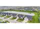 Aerial view of homes in a neighborhood next to a beautiful pond at 1295 Clairet Dr, Westfield, IN 46074