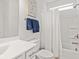 Clean bathroom features a shower with tub, white vanity, toilet, and modern fixtures at 1295 Clairet Dr, Westfield, IN 46074