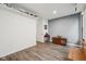 Bonus room showcasing hardwood flooring, overhead shelving, tasteful decor, and natural lighting at 1295 Clairet Dr, Westfield, IN 46074