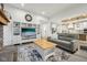 Spacious living room with a decorative entertainment center and open-concept design at 1295 Clairet Dr, Westfield, IN 46074