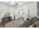 Inviting living room with wood floors, a geometric rug, and comfortable seating for relaxing and entertaining at 1295 Clairet Dr, Westfield, IN 46074