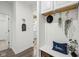 Welcoming mud room with coat hooks, a bench, and stylish decor at 1295 Clairet Dr, Westfield, IN 46074