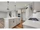 Spacious kitchen with a large island, gas cooktop, and ample counter space at 12951 Corydon Dr, Fishers, IN 46037