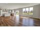Open-concept kitchen featuring a center island and seamless flow into the living and dining areas at 12951 Corydon Dr, Fishers, IN 46037
