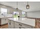 Well-designed kitchen with an island, stainless steel appliances and an open layout at 12951 Corydon Dr, Fishers, IN 46037