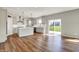Modern kitchen featuring a center island, stainless steel appliances, and access to the backyard at 12951 Corydon Dr, Fishers, IN 46037