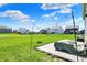 Paver patio with lighting, grill, and neighborhood views, perfect for outdoor gatherings at 12951 Corydon Dr, Fishers, IN 46037