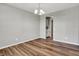 Room with wood flooring and view of kitchen at 12951 Corydon Dr, Fishers, IN 46037
