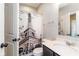 Bathroom features a decorative Eiffel Tower shower curtain, vanity with a marble countertop, and large mirror at 1370 Timber Bluff Rd, Westfield, IN 46074