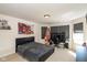 This bedroom features a full sized bed, computer desk and gaming setup at 1370 Timber Bluff Rd, Westfield, IN 46074