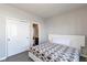 Bedroom with a neutral color scheme, closet, and connecting doorway to en-suite bathroom at 1370 Timber Bluff Rd, Westfield, IN 46074