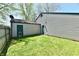 Well-maintained backyard with a small lawn and detached garage, offering a secluded outdoor space at 1472 Maria Ave, Franklin, IN 46131