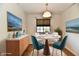 Inviting dining area with a round table, modern chairs, and contemporary decor at 1472 Maria Ave, Franklin, IN 46131