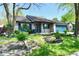 Charming single-story home with a well-maintained front yard, blue shutters, and an attached garage at 1472 Maria Ave, Franklin, IN 46131