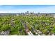 Stunning aerial view of a neighborhood with the city skyline in the distance, showcasing an ideal location at 1510 Central Ave, Indianapolis, IN 46202