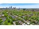 Expansive aerial shot showcases residential real estate amidst a green cityscape with skyline views at 1510 Central Ave, Indianapolis, IN 46202