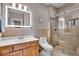 Modern bathroom with a glass-enclosed shower, spacious vanity, and updated fixtures at 1510 Central Ave, Indianapolis, IN 46202