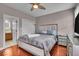 Bright bedroom features a view to an ensuite bathroom and closet space at 1510 Central Ave, Indianapolis, IN 46202