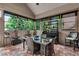 Charming sunroom with tiled floor, ample windows, and plenty of natural light at 1510 Central Ave, Indianapolis, IN 46202