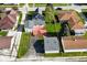 Spacious backyard with a wooden deck, detached garage, and ample green space for relaxation at 1615 N E St, Elwood, IN 46036