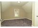 Bedroom featuring neutral walls and carpet, textured ceiling, and a single window at 1615 N E St, Elwood, IN 46036