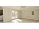 Living room with french doors to the outside, recessed lighting and new floors at 1615 N E St, Elwood, IN 46036