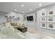Cozy basement featuring comfortable seating, modern decor, and ample space for leisure and recreation at 16726 Blackbird Ct, Noblesville, IN 46060