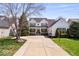 Charming two-story home with a spacious driveway and well-manicured lawn and front porch at 16726 Blackbird Ct, Noblesville, IN 46060