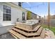 Outdoor hot tub with wooden steps, perfect for relaxing in the backyard at 16726 Blackbird Ct, Noblesville, IN 46060