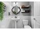 Charming powder room featuring wainscoting, a pedestal sink, and stylish decor at 16726 Blackbird Ct, Noblesville, IN 46060