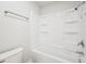 Clean and modern bathroom showcasing a shower-tub combination and ample space at 16780 Lowell Dr, Noblesville, IN 46060