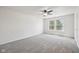 Bedroom featuring carpet, neutral walls, ceiling fan, and abundant natural light at 16780 Lowell Dr, Noblesville, IN 46060