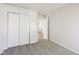 Bedroom with carpet, closet, and neutral paint at 16780 Lowell Dr, Noblesville, IN 46060