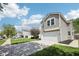 Well-kept home with a spacious driveway, lush lawn, and welcoming facade at 16780 Lowell Dr, Noblesville, IN 46060