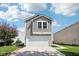 Charming two-story home with a well-maintained lawn and inviting curb appeal at 16780 Lowell Dr, Noblesville, IN 46060