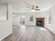 Bright living room with a cozy fireplace and ample natural light at 16780 Lowell Dr, Noblesville, IN 46060