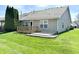 Backyard showcasing the deck, yard and the home's outdoor living space at 16869 Cimarron Pass, Noblesville, IN 46060