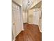 Hallway with vinyl floors, coat closet, and access to all rooms in this freshly painted house at 16869 Cimarron Pass, Noblesville, IN 46060
