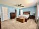 Comfortable main bedroom features neutral carpeting, and ample natural lighting at 16869 Cimarron Pass, Noblesville, IN 46060
