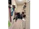 Organized pantry with shelving and cleaning supplies stored neatly in this convenient space at 16869 Cimarron Pass, Noblesville, IN 46060