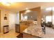 Well-lit kitchen with granite countertops, stainless steel appliances, and an open view into the cozy living room at 1884 Misty Lake Dr, Indianapolis, IN 46260