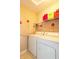 Well-organized laundry room with washer and dryer at 1884 Misty Lake Dr, Indianapolis, IN 46260