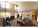 Bright living room with soaring ceilings, neutral paint, plush carpet, and a cozy fireplace at 1884 Misty Lake Dr, Indianapolis, IN 46260